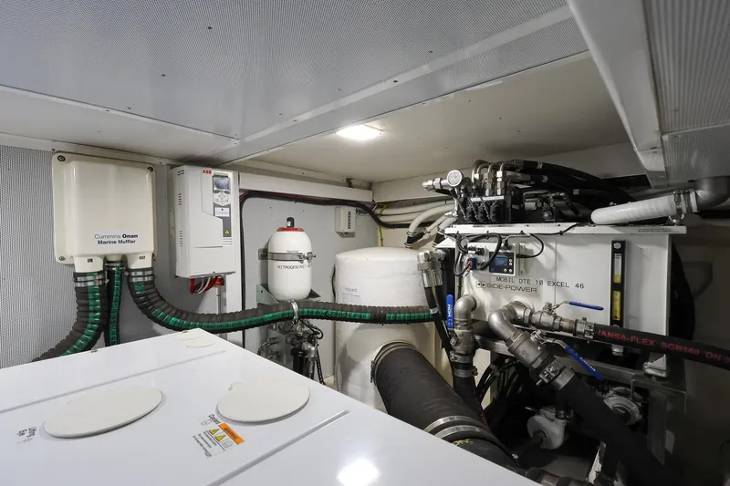 Mas Que Nada Yacht Photos Pics Engine room of 2021 Greenline OceanClass 68 yacht, showcasing mechanical systems and components.