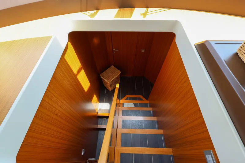 Mas Que Nada Yacht Photos Pics Staircase in 2021 Greenline OceanClass 68 yacht with wooden interior design.