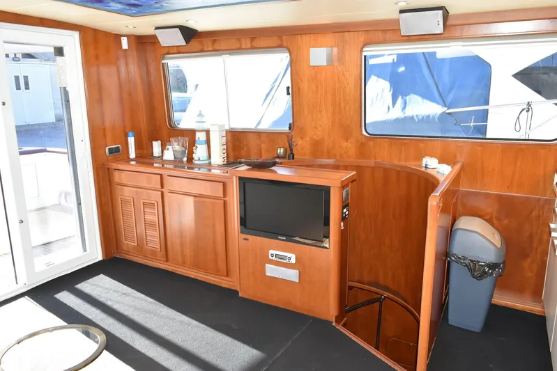 Alieva Yacht Photos Pics Luxurious interior of 2010 Joubert-Nivelt ALIEVA 60 yacht with wood paneling and modern amenities.