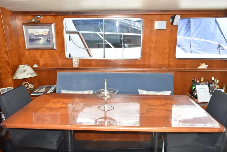 Alieva Yacht Photos Pics Luxurious interior of 2010 Joubert-Nivelt ALIEVA 60 yacht with elegant dining area.