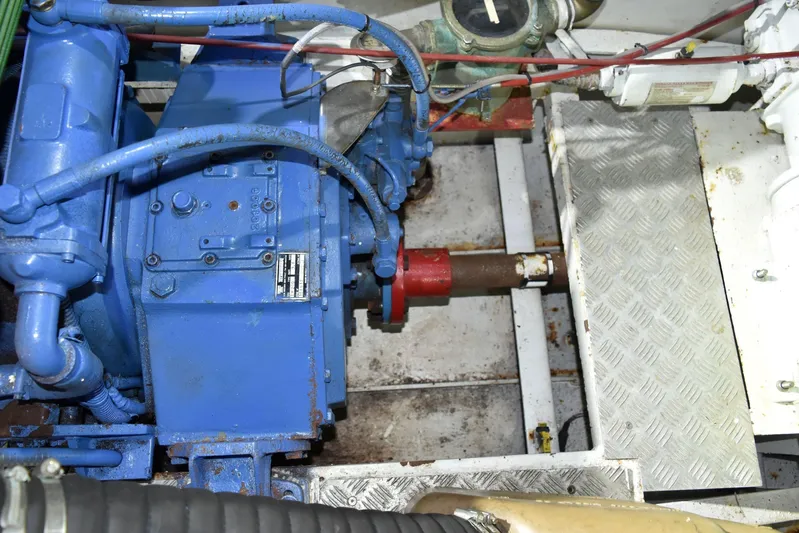 Alieva Yacht Photos Pics Engine room of 2010 Joubert-Nivelt ALIEVA 60 yacht, featuring blue machinery components.