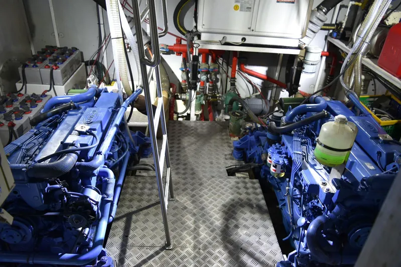 Alieva Yacht Photos Pics Engine room of 2010 Joubert-Nivelt ALIEVA 60 yacht with dual blue engines.