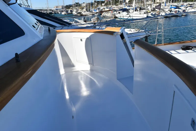 Alieva Yacht Photos Pics Sleek deck of 2010 Joubert-Nivelt ALIEVA 60 yacht in marina setting.
