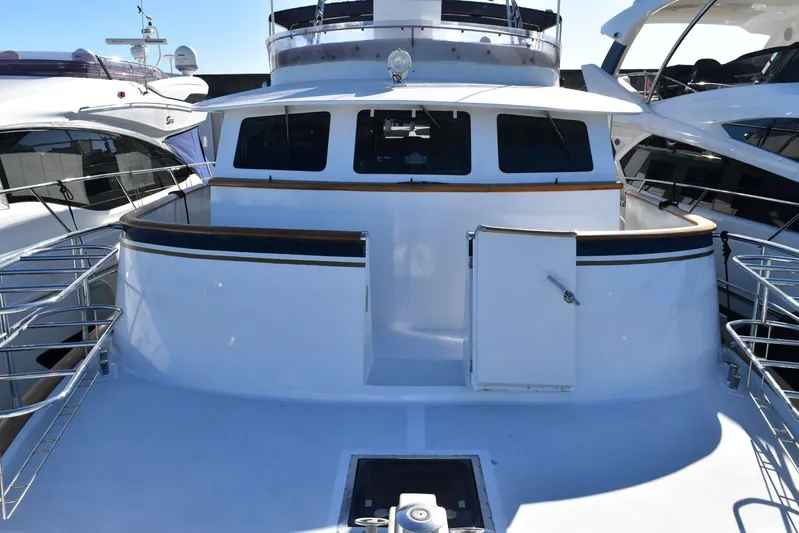 Alieva Yacht Photos Pics Joubert-Nivelt ALIEVA 60 yacht, 2010 model, docked with sleek white exterior.