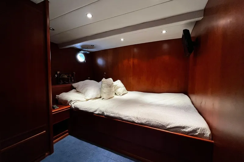 Alieva Yacht Photos Pics Luxurious cabin interior of 2010 Joubert-Nivelt ALIEVA 60 yacht with cozy bedding.