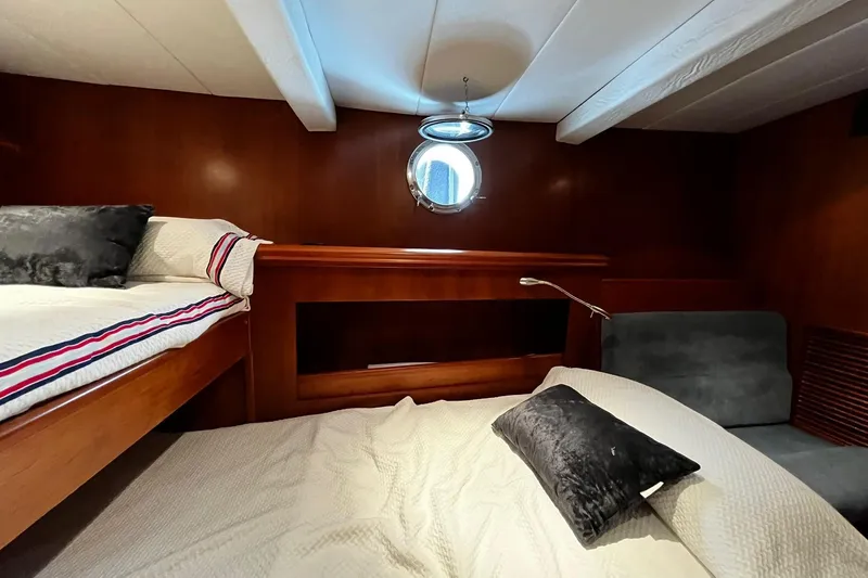 Alieva Yacht Photos Pics Luxurious cabin interior of 2010 Joubert-Nivelt ALIEVA 60 yacht with cozy bedding.