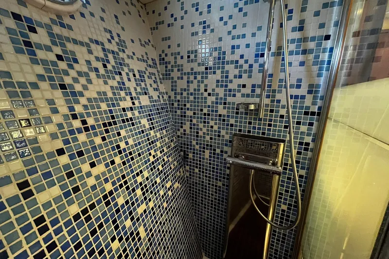 Alieva Yacht Photos Pics Mosaic-tiled shower in 2010 Joubert-Nivelt ALIEVA 60 yacht bathroom.