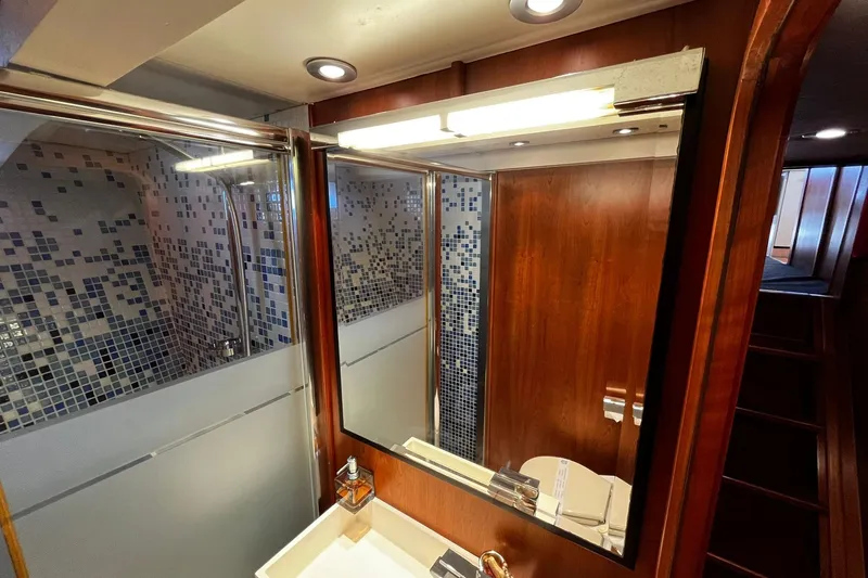 Alieva Yacht Photos Pics Luxurious bathroom interior of 2010 Joubert-Nivelt ALIEVA 60 yacht with modern fixtures.
