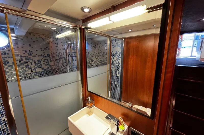 Alieva Yacht Photos Pics Luxurious bathroom in 2010 Joubert-Nivelt ALIEVA 60 yacht with modern fixtures and mosaic tiles.