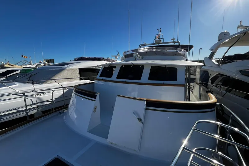 Alieva Yacht Photos Pics Joubert-Nivelt ALIEVA 60 yacht, 2010 model, docked under clear blue sky.