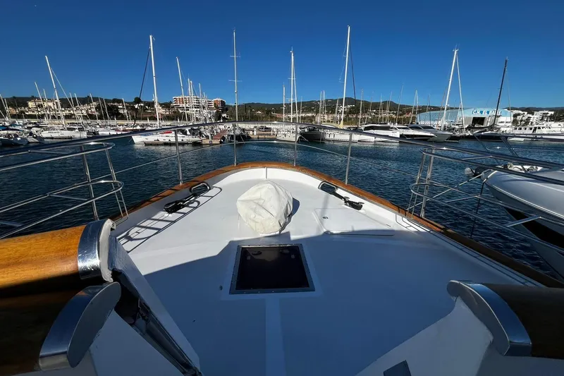 Alieva Yacht Photos Pics Bow view of 2010 Joubert-Nivelt ALIEVA 60 yacht docked in a marina.