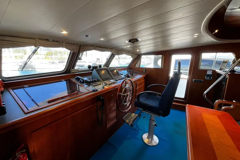 Alieva Yacht Photos Pics Pilothouse interior of 2010 Joubert-Nivelt ALIEVA 60 yacht with navigation equipment.
