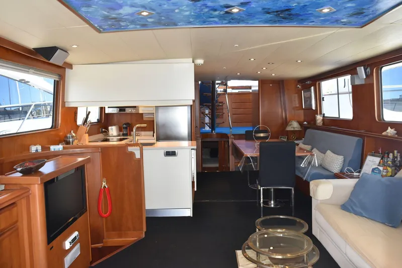 Alieva Yacht Photos Pics Luxurious interior of 2010 Joubert-Nivelt ALIEVA 60 yacht with modern amenities and elegant design.