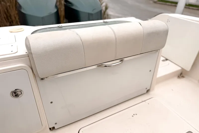  Yacht Photos Pics 2014 Pursuit S 280 Sport boat seat with storage compartment.