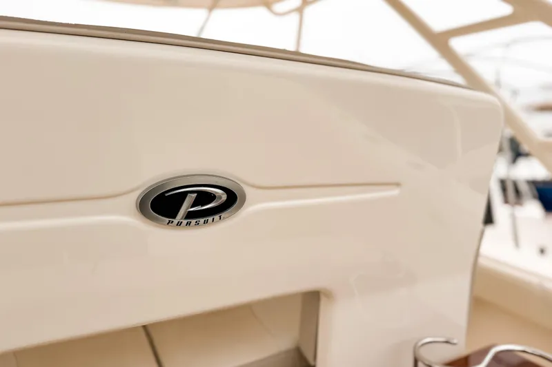  Yacht Photos Pics 2014 Pursuit S 280 Sport boat interior with logo detail.