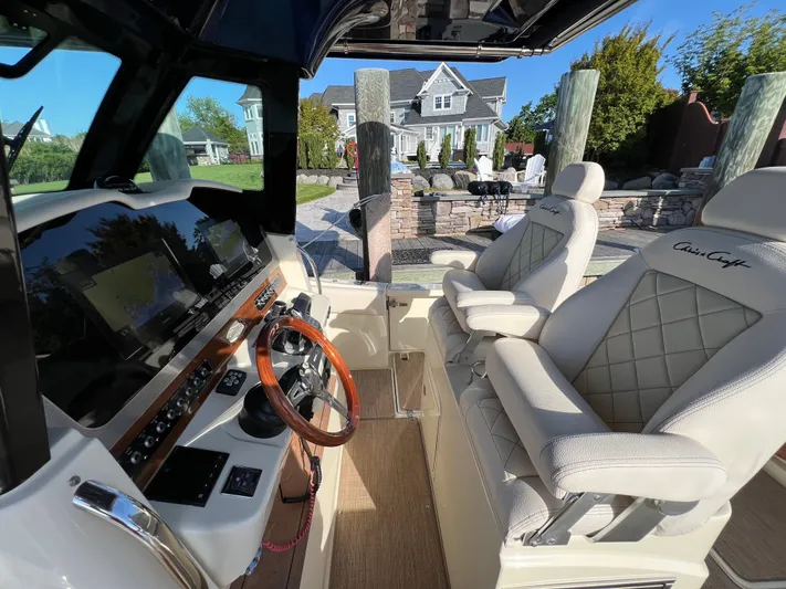 Sea Senora Yacht Photos Pics 2022 Chris-Craft Catalina 30 helm with luxurious seating and modern controls.