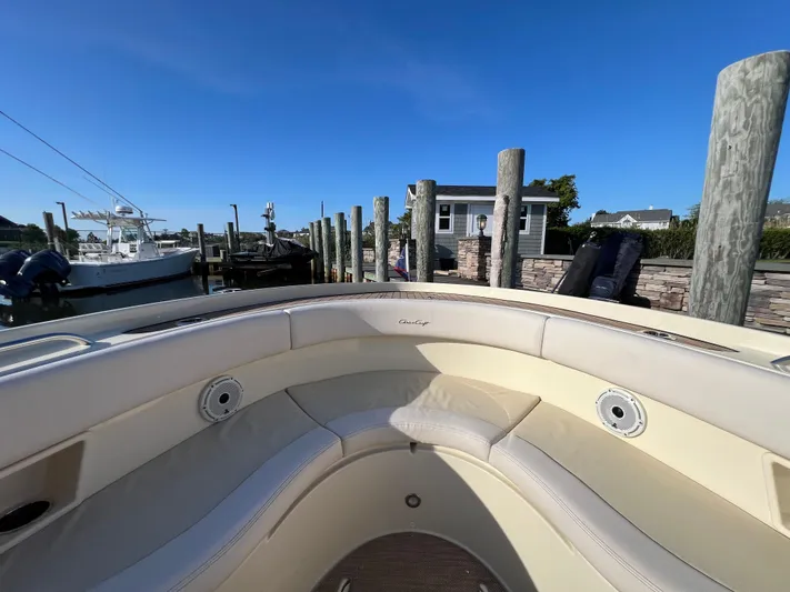 Sea Senora Yacht Photos Pics 2022 Chris-Craft Catalina 30 boat docked at a marina with clear blue sky.