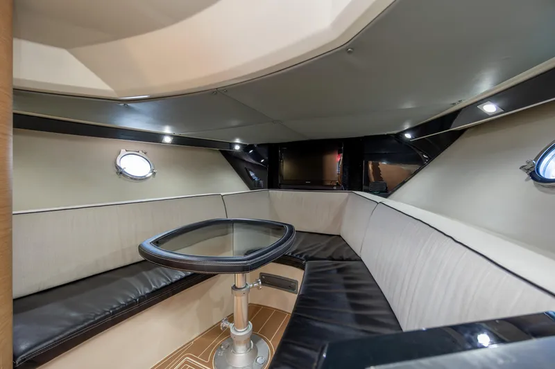  Yacht Photos Pics Interior of 2009 Sessa Marine Key Largo 36 with elegant seating and table.