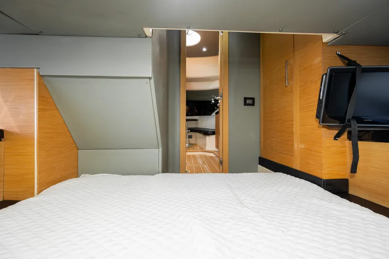 Yacht Photos Pics Interior cabin of 2009 Sessa Marine Key Largo 36 with modern wood finish.