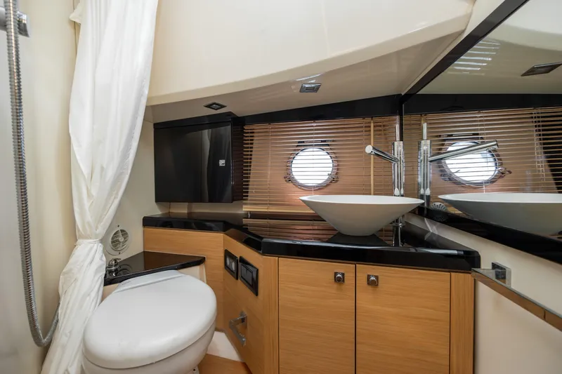  Yacht Photos Pics Luxurious bathroom in 2009 Sessa Marine Key Largo 36 yacht with modern fixtures.