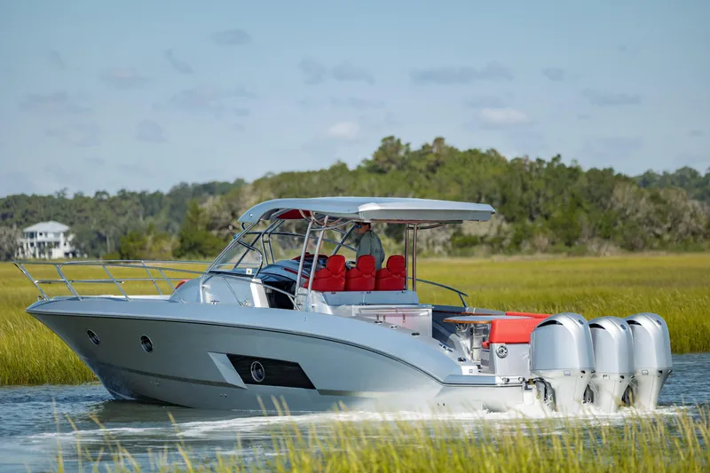  Yacht Photos Pics 2009 Sessa Marine Key Largo 36 cruising on a scenic waterway.