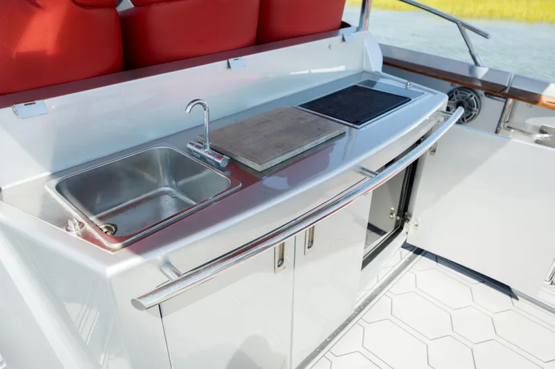  Yacht Photos Pics Outdoor kitchen on 2009 Sessa Marine Key Largo 36 yacht with sink and grill.