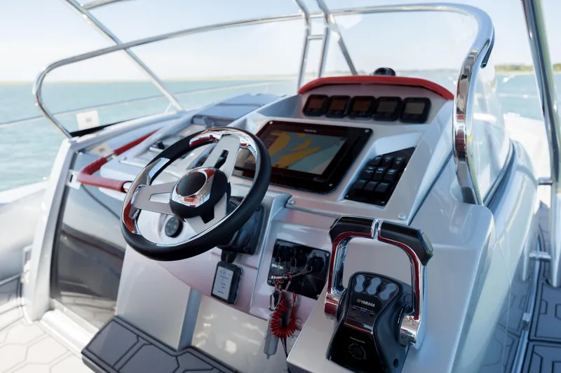  Yacht Photos Pics Sessa Marine Key Largo 36, 2009 model, boat cockpit with modern controls and steering wheel.