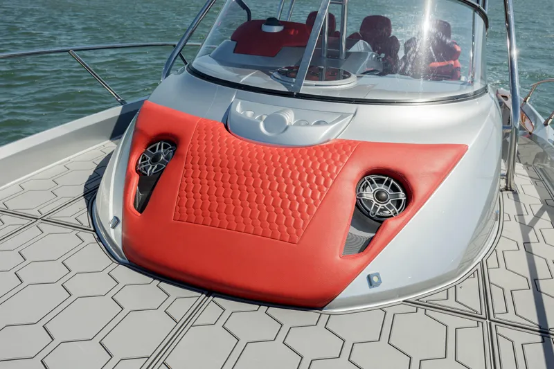  Yacht Photos Pics 2009 Sessa Marine Key Largo 36 boat with red upholstery and speakers on deck.