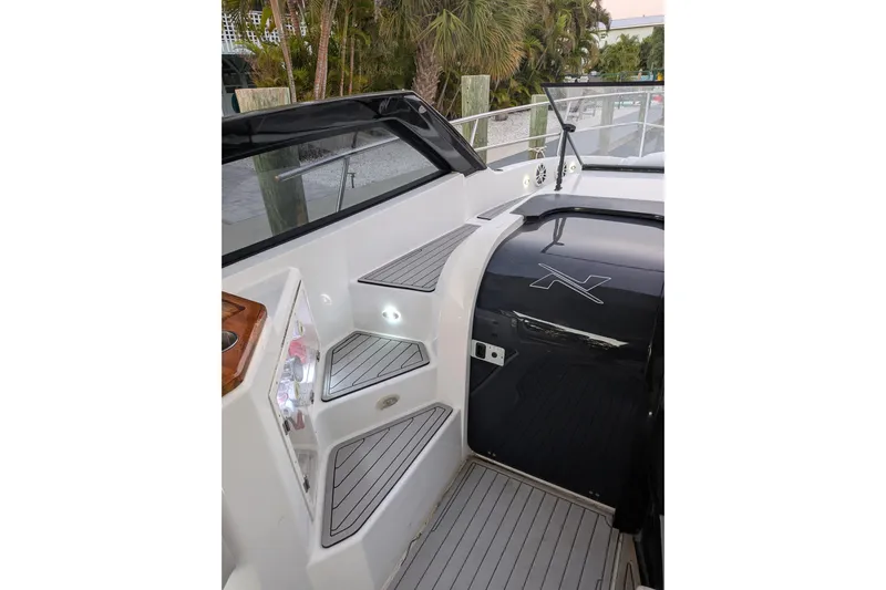 Mbvip Yacht Photos Pics 2023 NX Boats 340 Sport Coupe interior with sleek design and modern features.