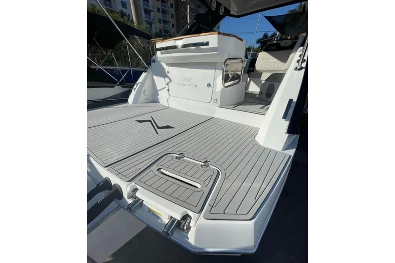 Mbvip Yacht Photos Pics 2023 NX Boats 340 Sport Coupe, sleek deck design, modern features, luxury yacht.