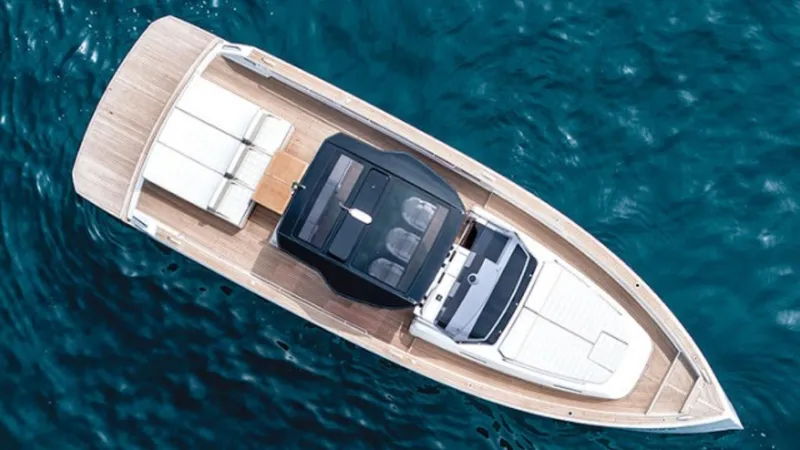 Yaaas Yacht Photos Pics 2024 Pardo Yachts P43 luxury yacht on blue ocean water, aerial view.