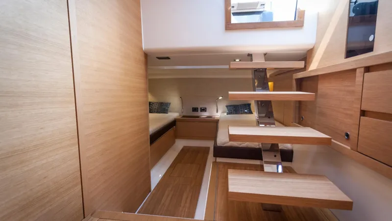 Yaaas Yacht Photos Pics Interior of 2024 Pardo Yachts P43, featuring modern wooden staircase and sleek design.
