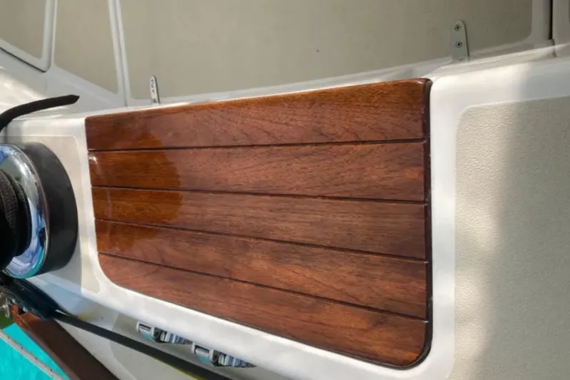 Bittersweet Yacht Photos Pics Polished wooden deck detail on 1989 Tartan 4100 sailboat.