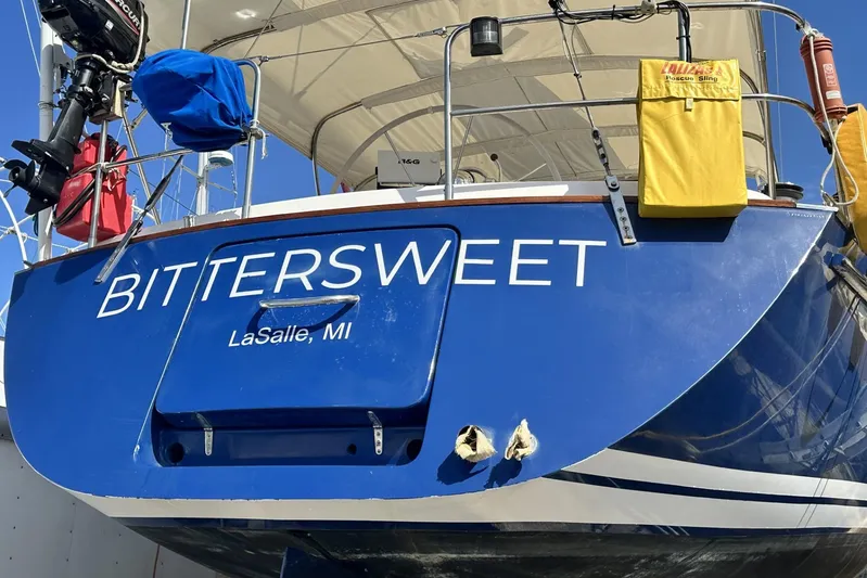 Bittersweet Yacht Photos Pics Blue Tartan 4100 sailboat named "Bittersweet" from LaSalle, MI, built in 1998.
