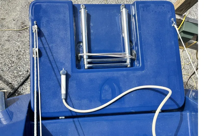 Bittersweet Yacht Photos Pics Blue deck of 1998 Tartan 4100 sailboat with ladder and ropes.