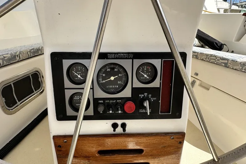 Bittersweet Yacht Photos Pics Control panel of a 1998 Tartan 4100 sailboat with gauges and switches.