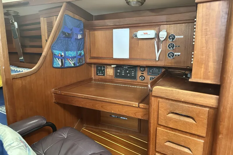 Bittersweet Yacht Photos Pics Interior of a 1998 Tartan 4100 sailboat with wooden navigation station.