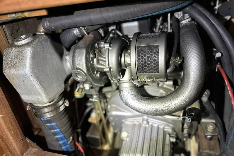 Bittersweet Yacht Photos Pics Engine compartment of a 1998 Tartan 4100, showcasing detailed mechanical components.