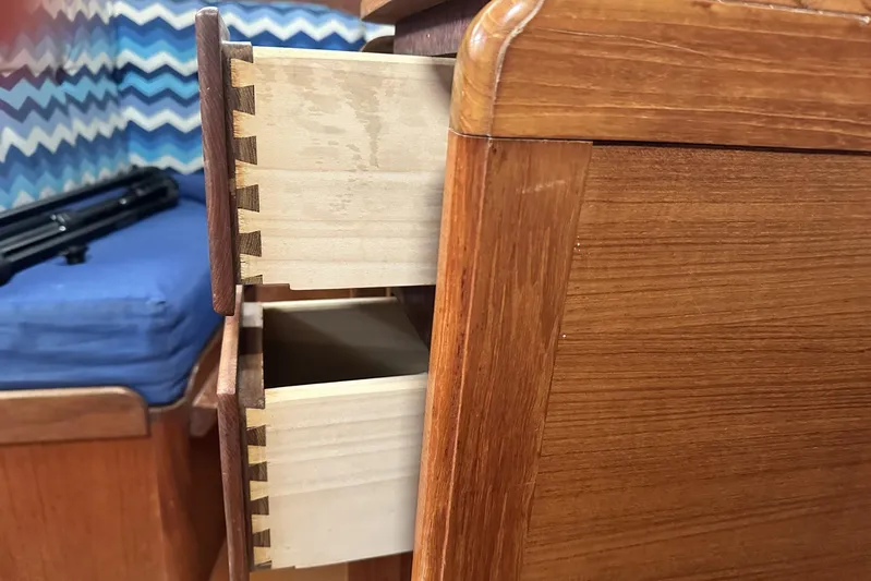 Bittersweet Yacht Photos Pics Wooden drawers with dovetail joints in a 1998 Tartan 4100 interior.