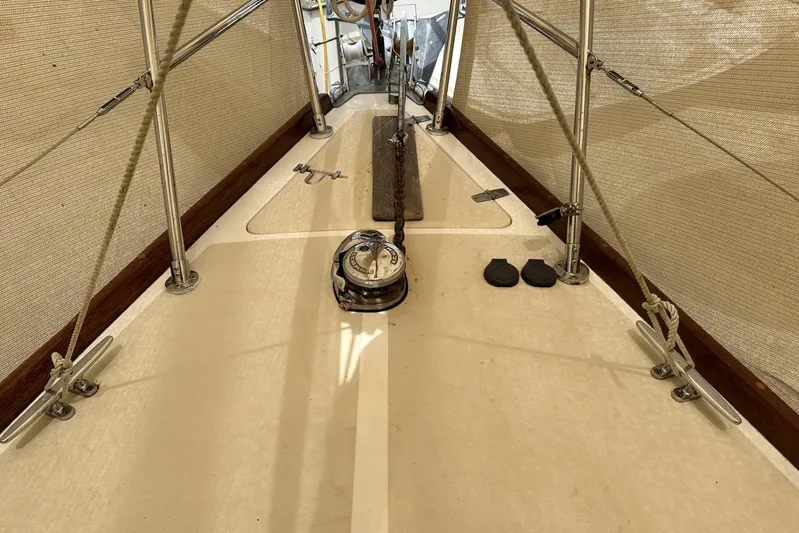 Bittersweet Yacht Photos Pics 1998 Tartan 4100 yacht deck with winch, ropes, and railing.