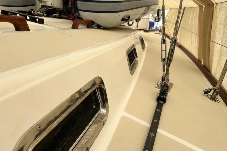 Bittersweet Yacht Photos Pics Deck view of a 1998 Tartan 4100 sailboat, featuring rigging and portholes.