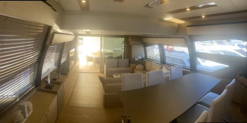  Yacht Photos Pics Luxurious interior of a 2012 Ferretti Yachts 720, featuring elegant seating and modern design.