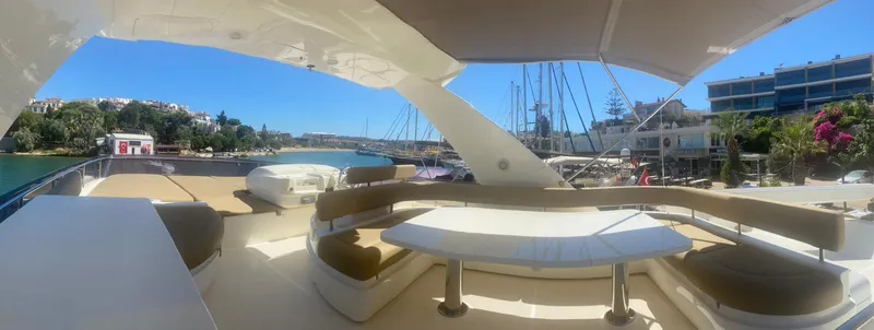  Yacht Photos Pics Luxurious 2012 Ferretti Yachts 720 with spacious deck and scenic marina view.