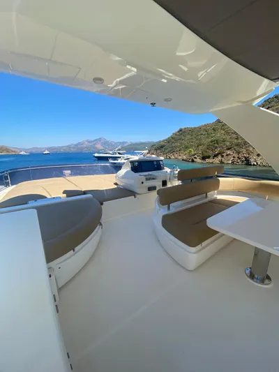  Yacht Photos Pics Luxurious 2012 Ferretti Yachts 720 with spacious deck and scenic ocean view.