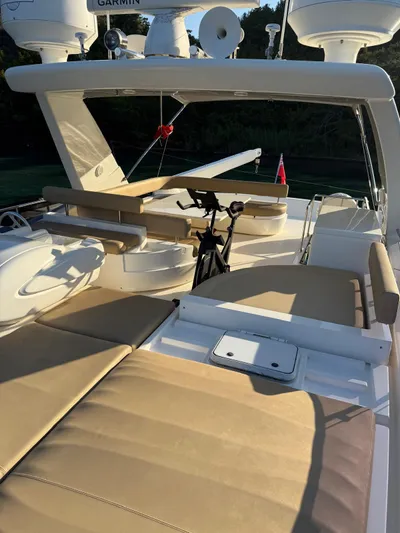  Yacht Photos Pics Luxurious 2012 Ferretti Yachts 720 deck with seating and navigation equipment.