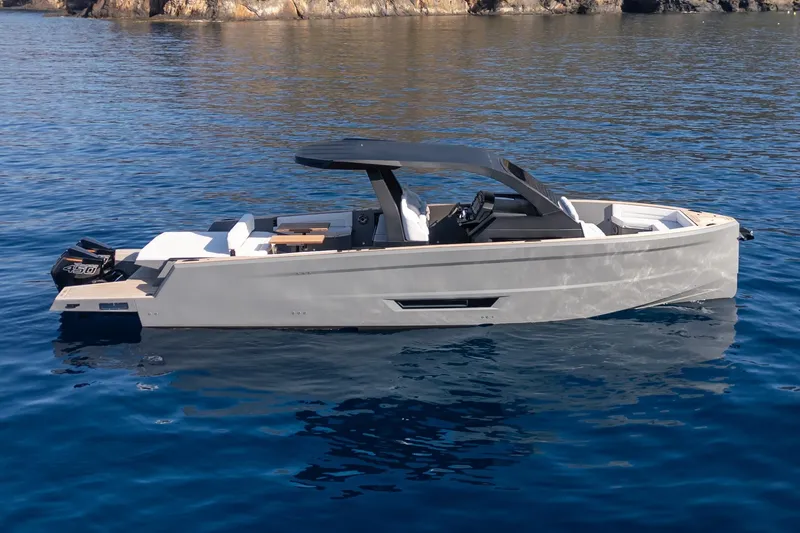 Maxim Yachts | Max43 Race Yacht Photos Pics 2026 Maxim Yachts 43 Race on calm blue water, showcasing sleek design and modern features.