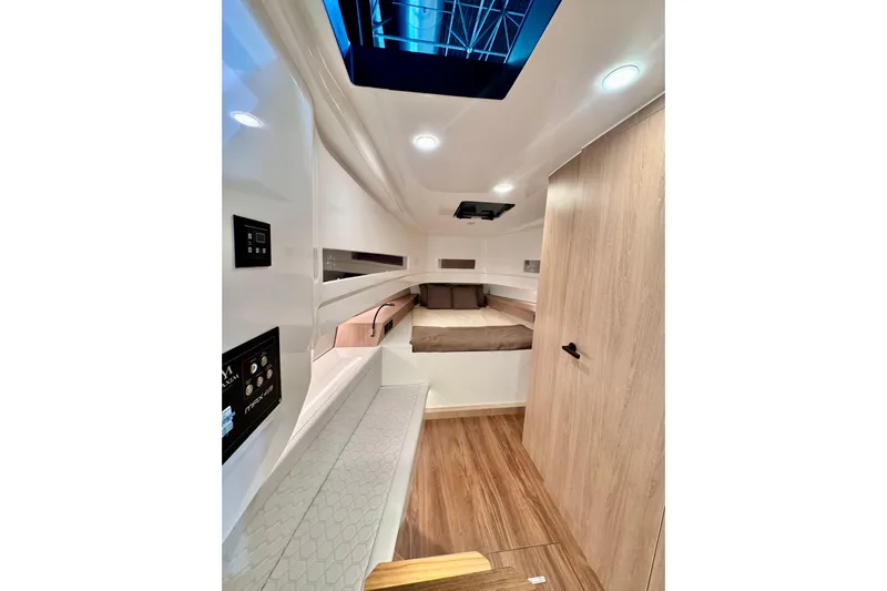 Maxim Yachts | Max43 Race Yacht Photos Pics Modern interior of 2026 Maxim Yachts 43 Race, featuring sleek design and wood accents.