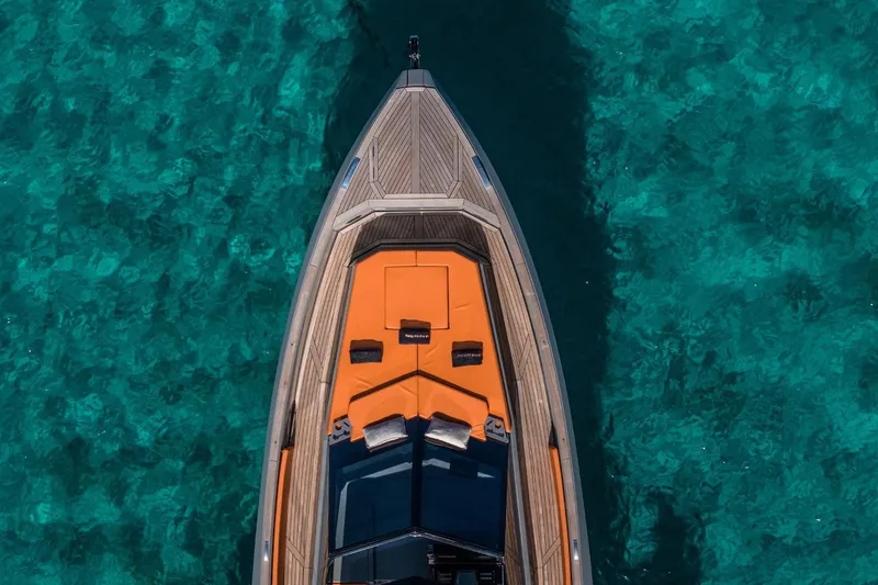 Mistral Yacht Photos Pics 2023 Evo Yachts R4 XT on clear turquoise water, top view.