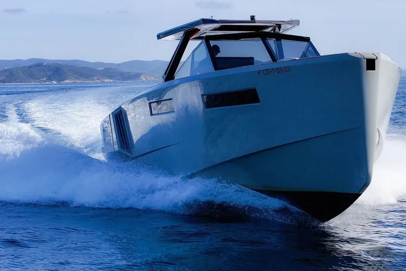 Mistral Yacht Photos Pics 2023 Evo Yachts R4 XT cruising on open water, showcasing sleek design and performance.