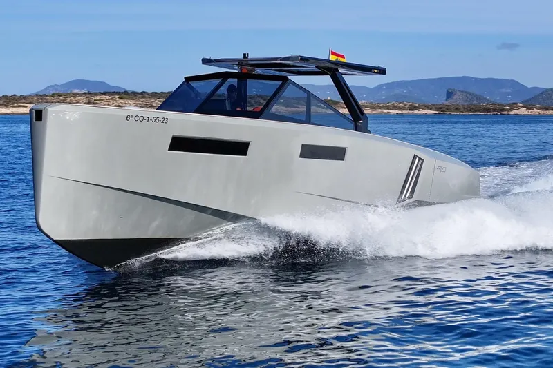 Mistral Yacht Photos Pics 2023 Evo Yachts R4 XT cruising on open water, showcasing sleek design and performance.